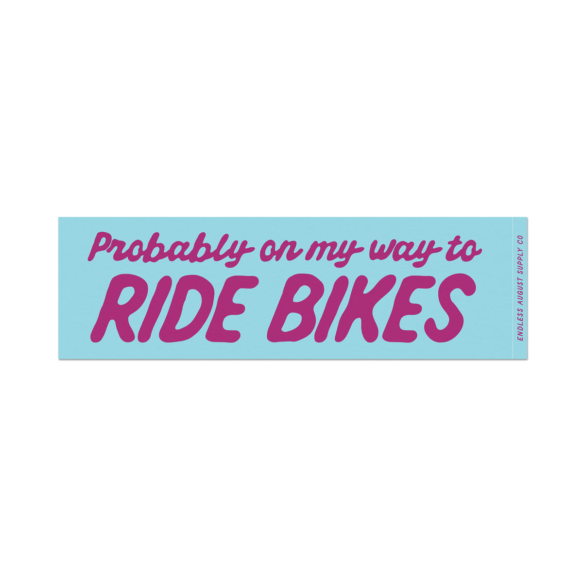 A rectangular bumper sticker with a light blue background and pink text that reads 'Probably on my way to RIDE BIKES'. The words 'RIDE BIKES' are in a larger, bold uppercase font, while the phrase 'Probably on my way to' is in a smaller script font.