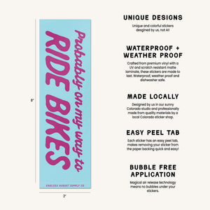 A product information graphic showing a light blue rectangular sticker with purple text reading 'Probably on my way to the Ride Bikes' on the left, alongside feature callouts such as 'UNIQUE DESIGNS,' 'WATERPROOF + WEATHER PROOF,' 'MADE LOCALLY,' 'EASY PEEL TAB,' and 'BUBBLE FREE APPLICATION.'.