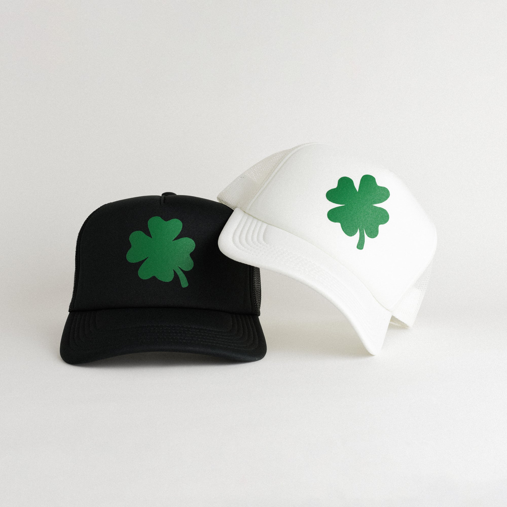 St. Patrick's Day 4 Leaf Clover Recycled Trucker Hat - snow